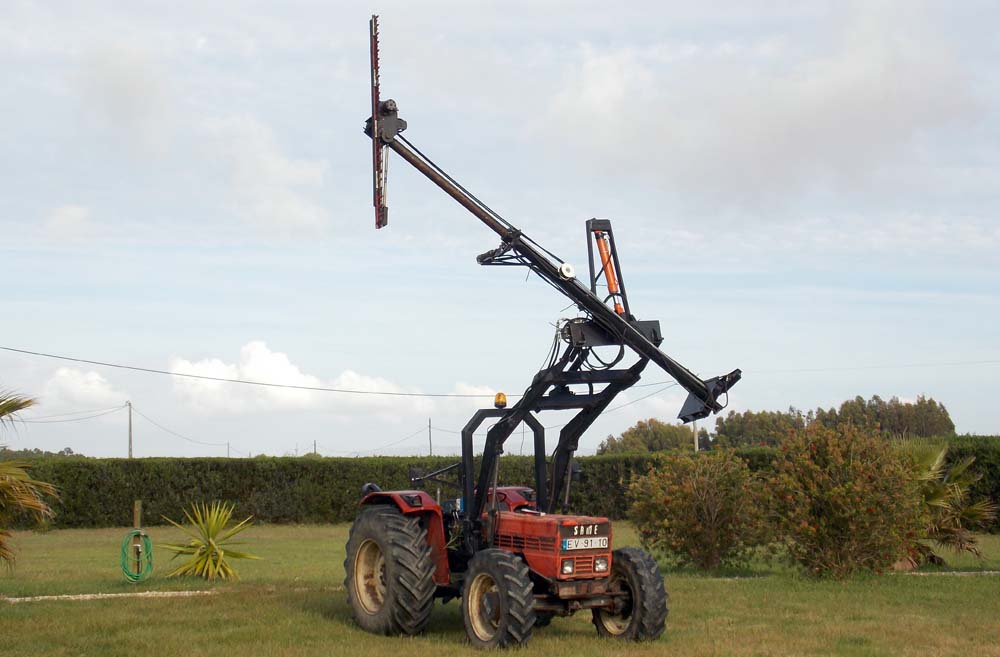 reciprocating home made high reach reversing hedge cutter